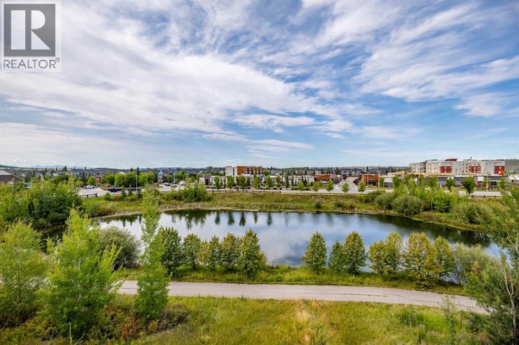 309, 250 Fireside View, Cochrane, Alberta T4C 2M2 - Photo 2 - A2341752
