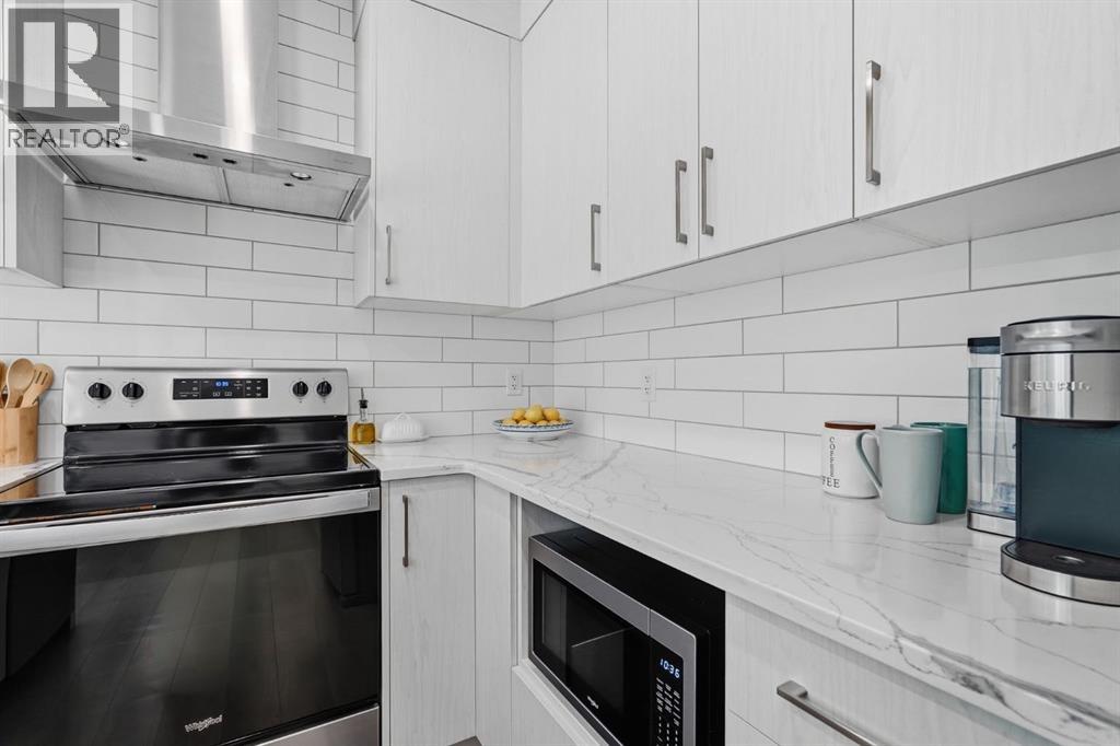 154 Crestridge Common Sw, Calgary, Alberta  T3B 6J5 - Photo 6 - A2341490