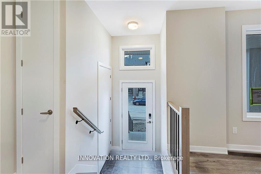 203 Speckled Alder Row, Ottawa, Ontario K2J 7G8 - Photo 3 - X13738418