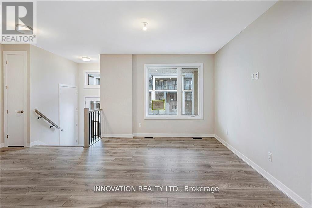 203 Speckled Alder Row, Ottawa, Ontario K2J 7G8 - Photo 4 - X13738418