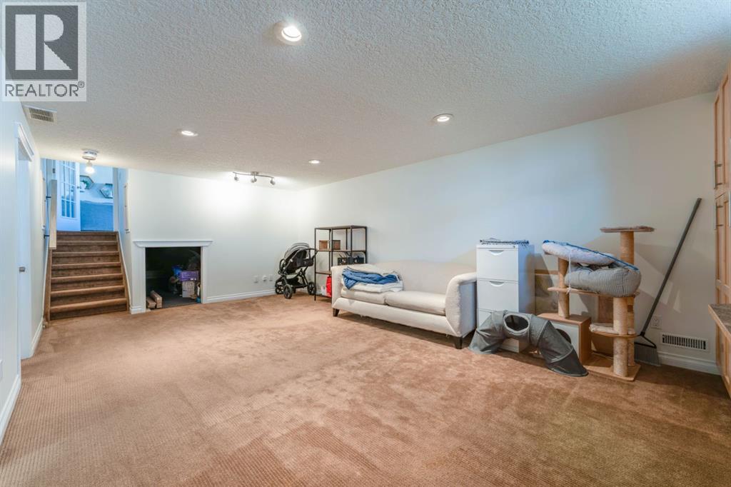 1004 Huntercove Place Nw, Calgary, Alberta  T2K 4S3 - Photo 30 - A2339545