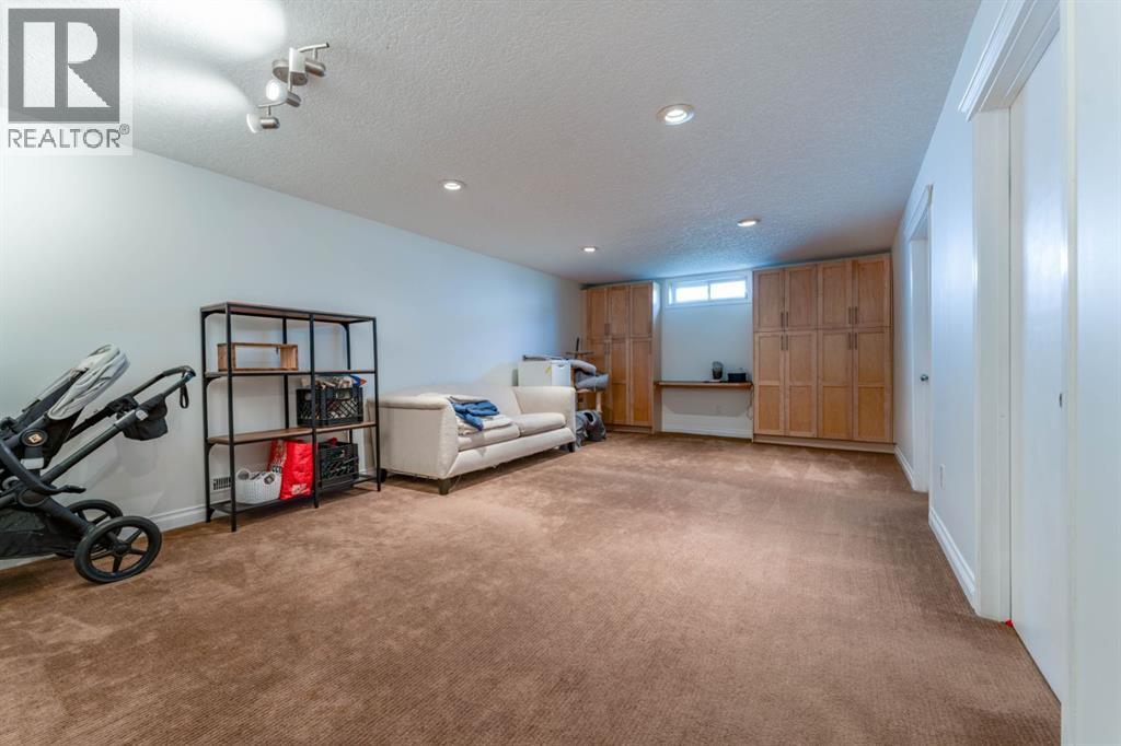1004 Huntercove Place Nw, Calgary, Alberta  T2K 4S3 - Photo 29 - A2339545