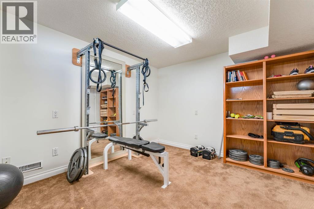 1004 Huntercove Place Nw, Calgary, Alberta  T2K 4S3 - Photo 28 - A2339545