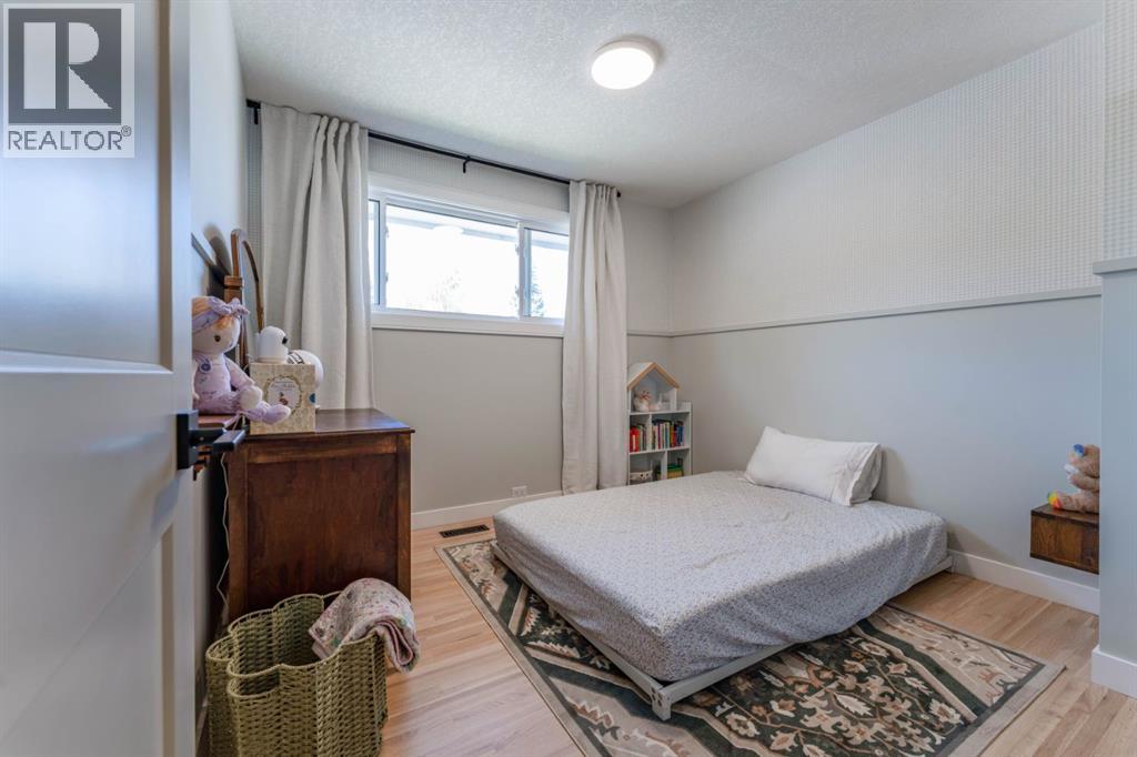 1004 Huntercove Place Nw, Calgary, Alberta  T2K 4S3 - Photo 21 - A2339545