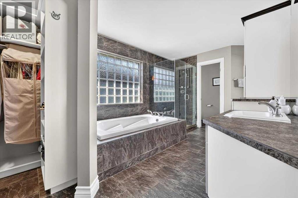 234 Elmont Bay SW, Calgary, Alberta T3H 4X9 - Photo 25 - A2341225