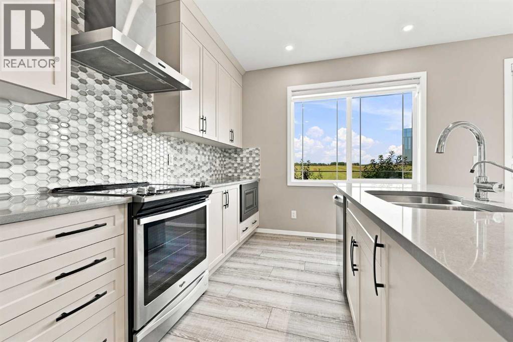 142 Yorkstone Way Sw, Calgary, Alberta  T2X 4S2 - Photo 9 - A2338419