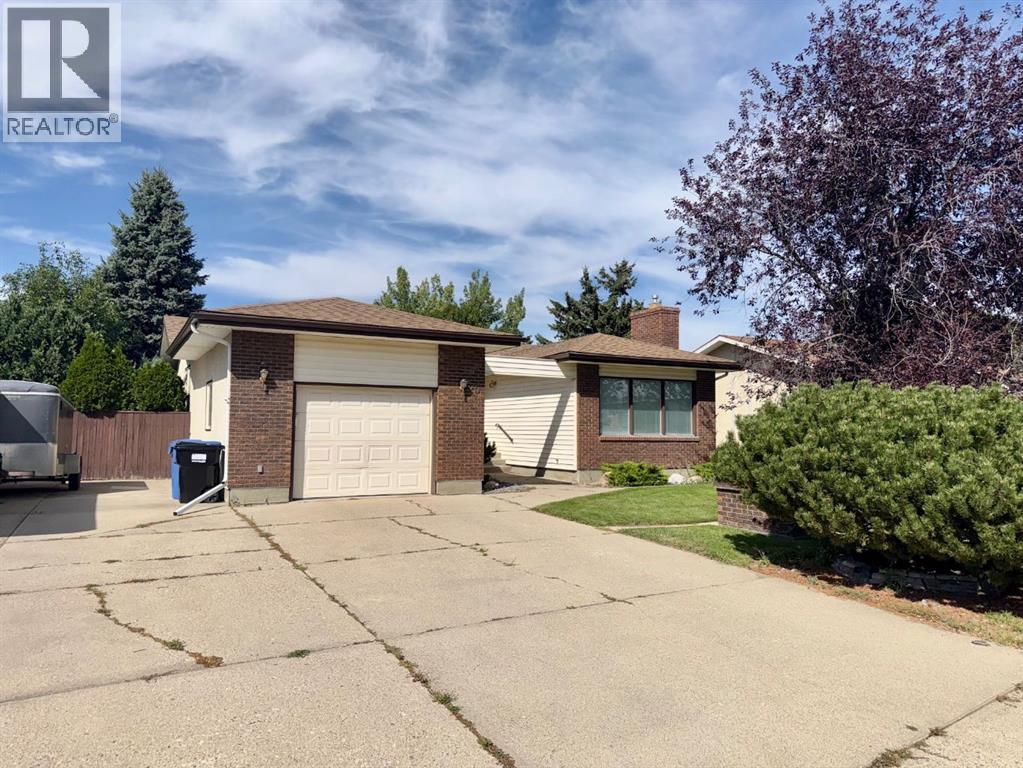 25 Nevada Place W, Lethbridge, Alberta  T1k 4A8 - Photo 1 - A2341960