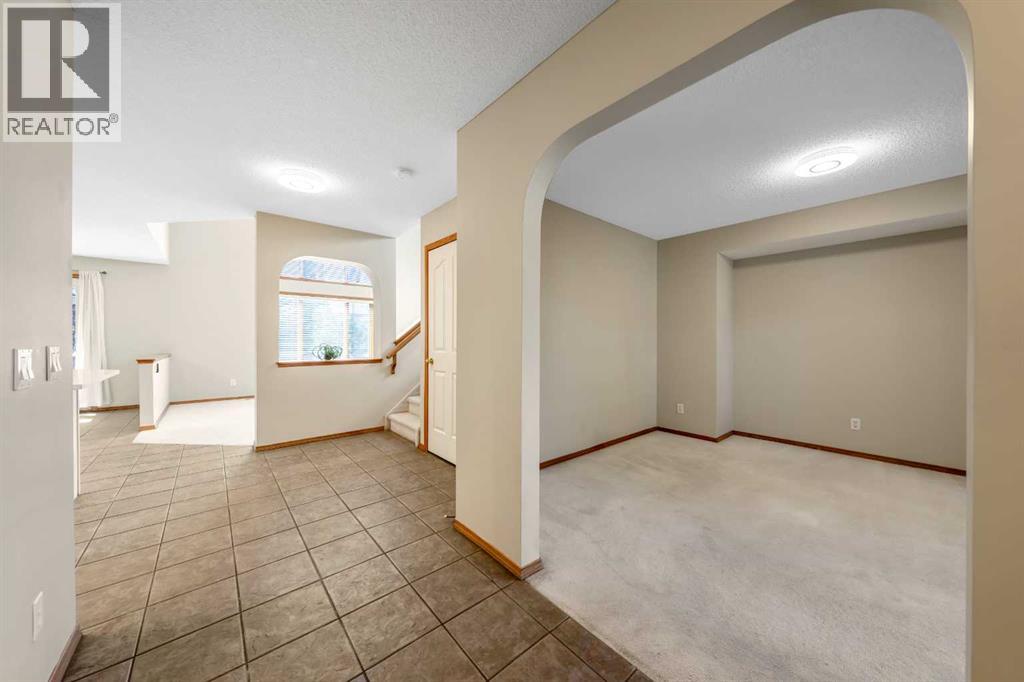 207 Citadel Peak Circle Nw, Calgary, Alberta  T3G 4E9 - Photo 3 - A2338563