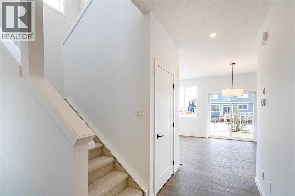 198 Dawson Harbour Hill, Chestermere, Alberta  T1X 2S4 - Photo 7 - A2331379
