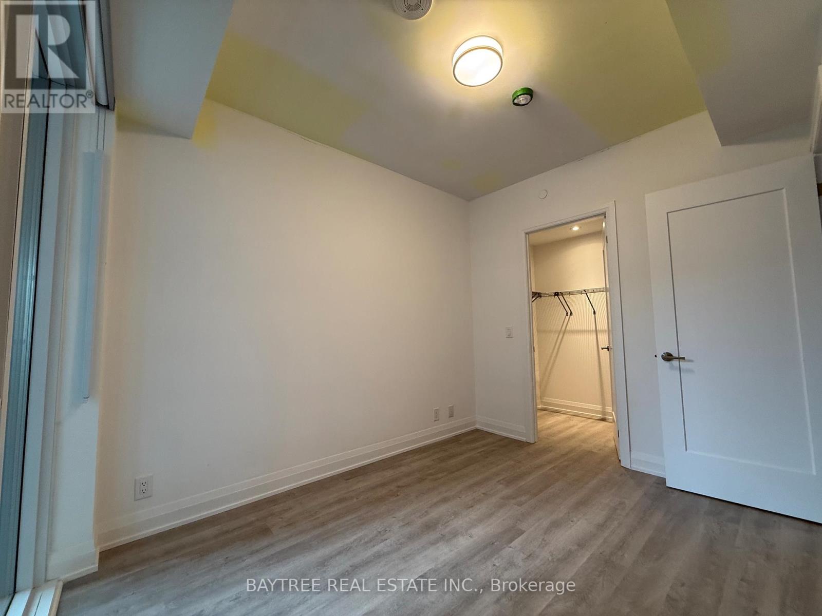 902 - 65 BROADWAY AVENUE