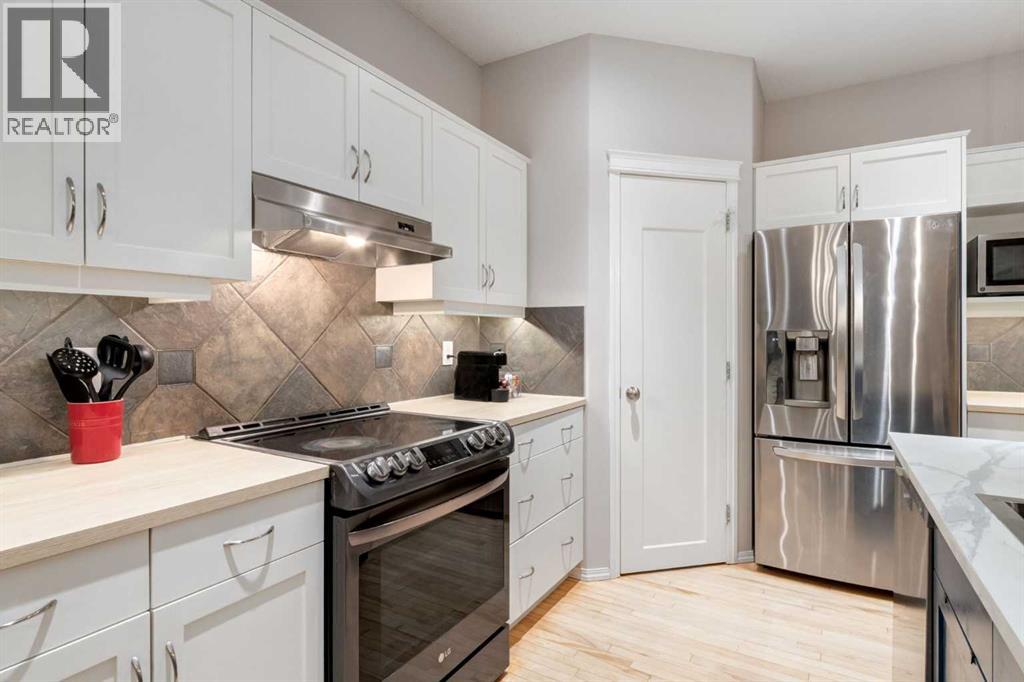 102 Springborough Point Sw, Calgary, Alberta T3H 5M9 - Photo 9 - A2341839