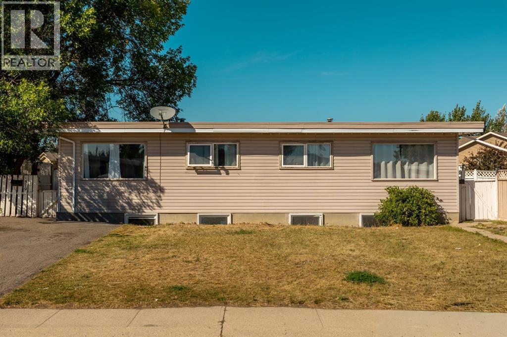 3319 - 3321 5a Avenue S, Lethbridge, Alberta  T1J 0Y4 - Photo 1 - A2341134