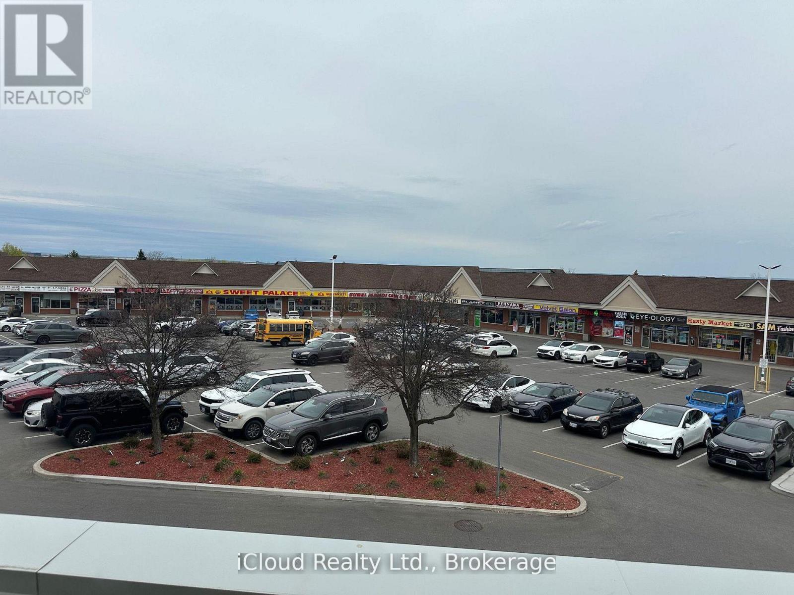 209 - 1090 Peter Robertson Boulevard, Brampton, Ontario L6R 3B3 - Photo 1 - W13742358