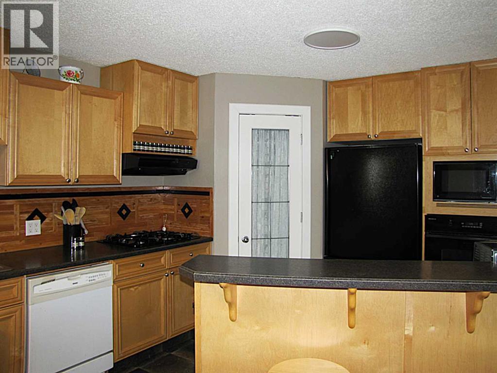 4923 52 Avenue, Taber, Alberta  T1G 1H6 - Photo 10 - A2320485