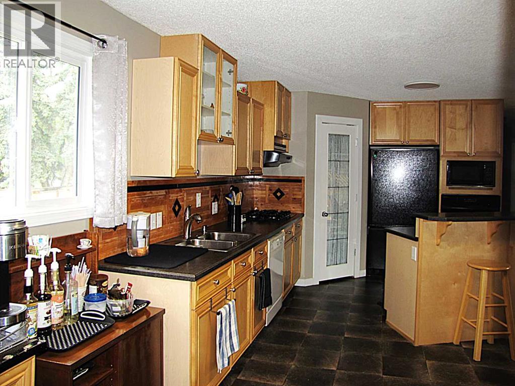 4923 52 Avenue, Taber, Alberta  T1G 1H6 - Photo 7 - A2320485
