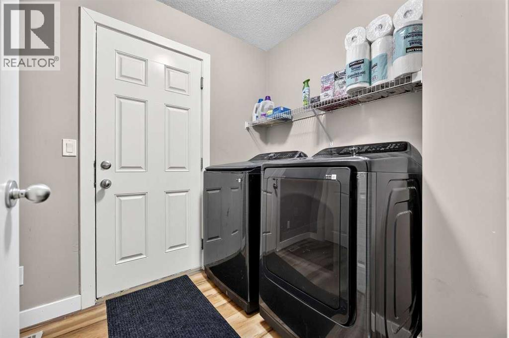 74 Heritage Landing, Cochrane, Alberta  T4C 0E3 - Photo 18 - A2342084
