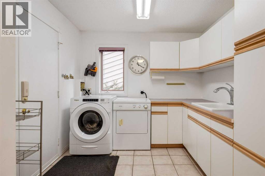 660 Coach Grove Road Sw, Calgary, Alberta  T3H 1C6 - Photo 19 - A2339456