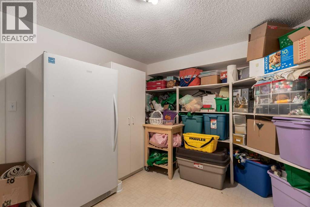 660 Coach Grove Road Sw, Calgary, Alberta  T3H 1C6 - Photo 35 - A2339456