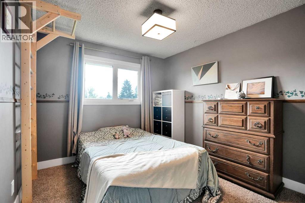 35 Queen Isabella Close Se, Calgary, Alberta  T2J 3R2 - Photo 16 - A2339902