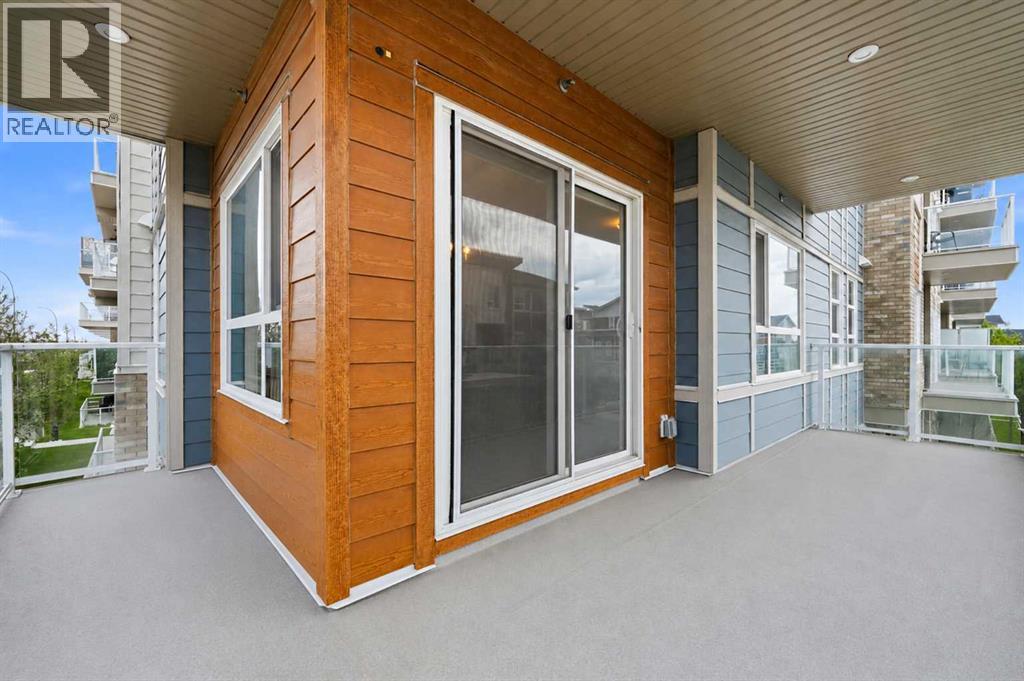 210, 370 Harvest Hills Common Ne, Calgary, Alberta T3K 2M8 - Photo 24 - A2321745