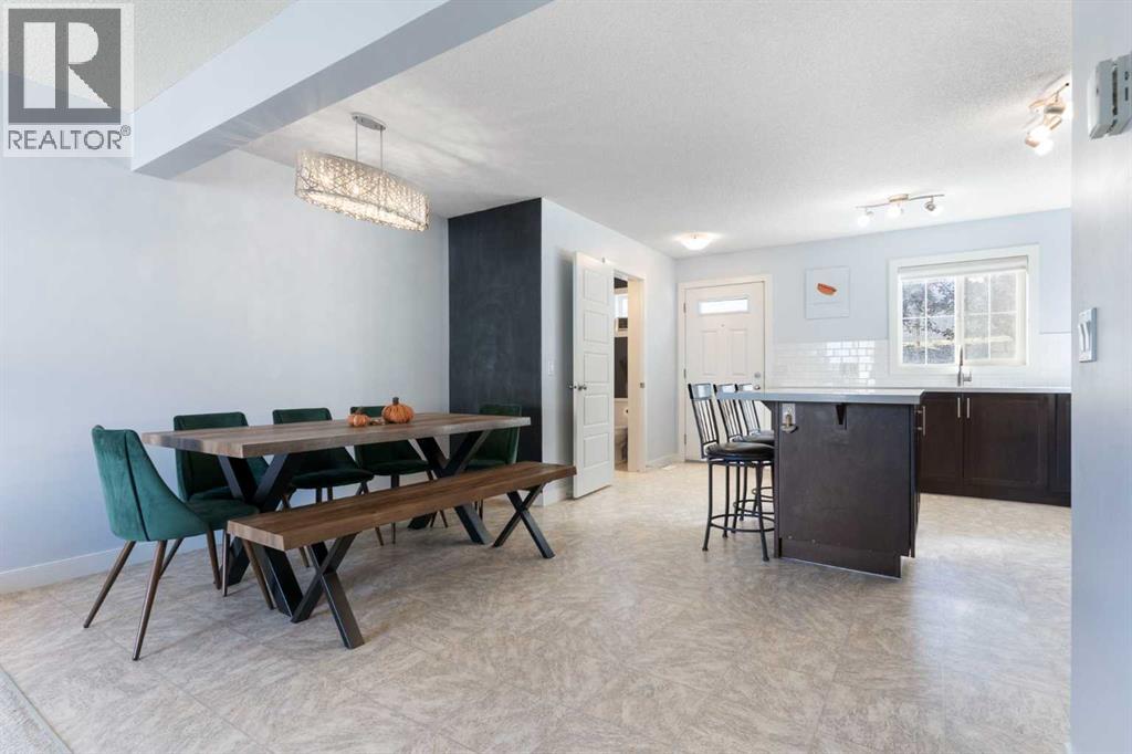 90 Pantego Lane NW, Calgary, Alberta  T3K 0T1 - Photo 6 - A2316923