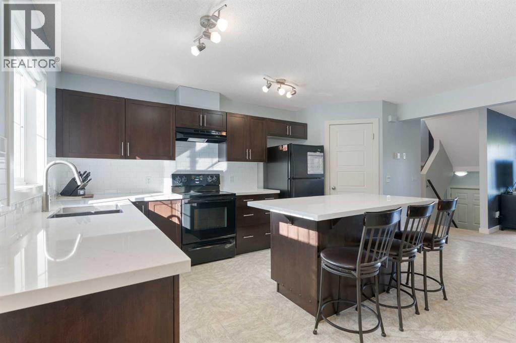 90 Pantego Lane NW, Calgary, Alberta  T3K 0T1 - Photo 12 - A2316923