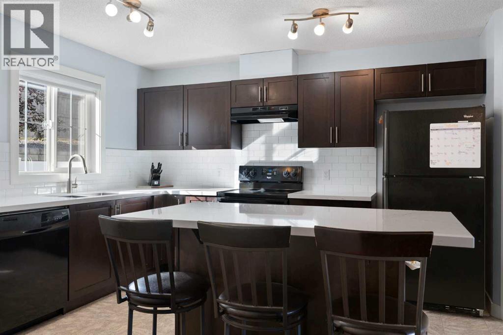 90 Pantego Lane NW, Calgary, Alberta  T3K 0T1 - Photo 9 - A2316923