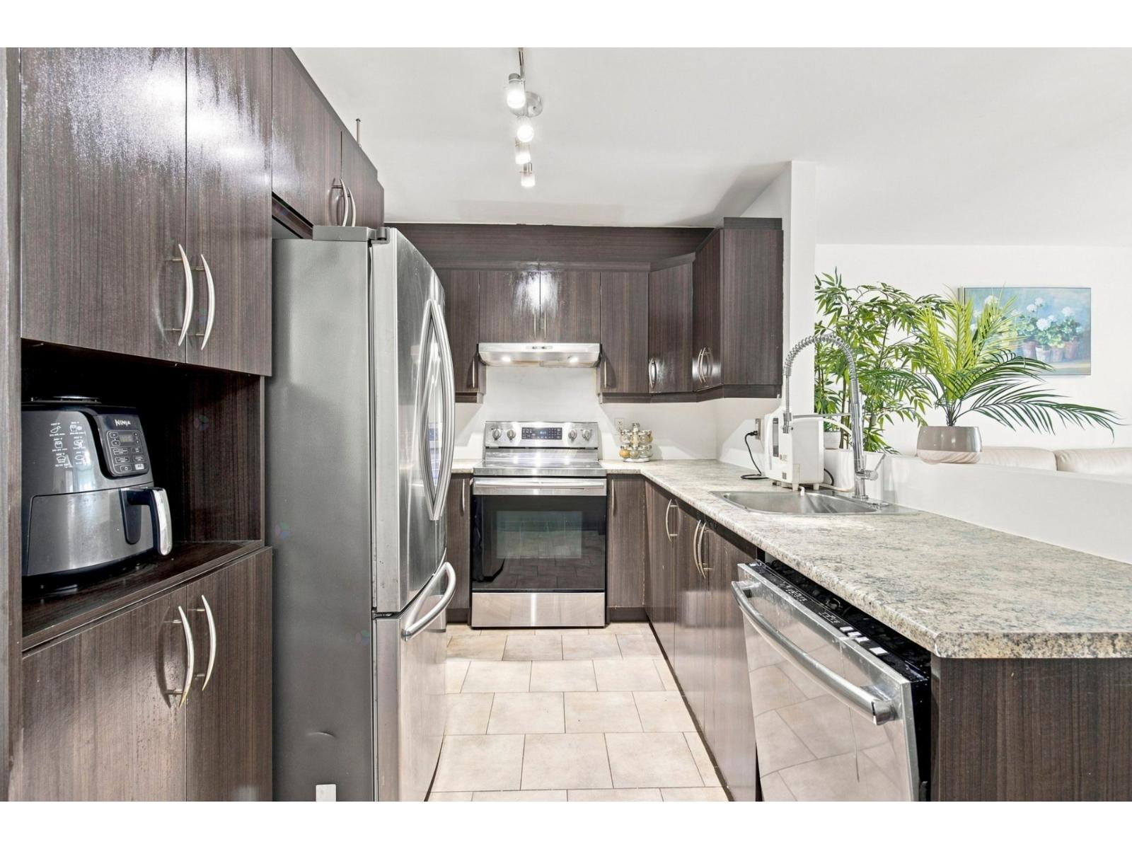 7150 Rue du Chardonneret|#4 Brossard Quebec Canada J4Z0B3 3