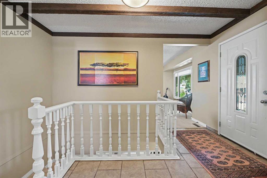 231 Cedarille Green Sw, Calgary, Alberta  T2W 2H3 - Photo 3 - A2338687