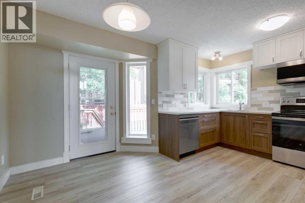 31 Deer Place SE, Calgary, Alberta  T2J 6W6 - Photo 7 - A2341381