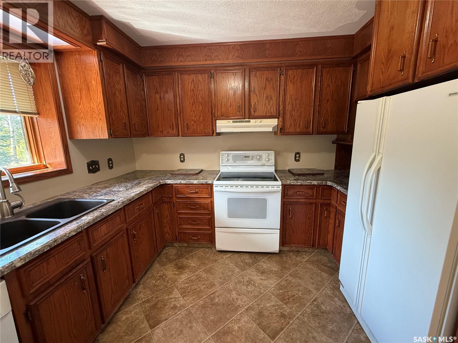 306 20th Avenue Nw, Buckland Rm No. 491, Saskatchewan  S6V 5R3 - Photo 3 - SK047339