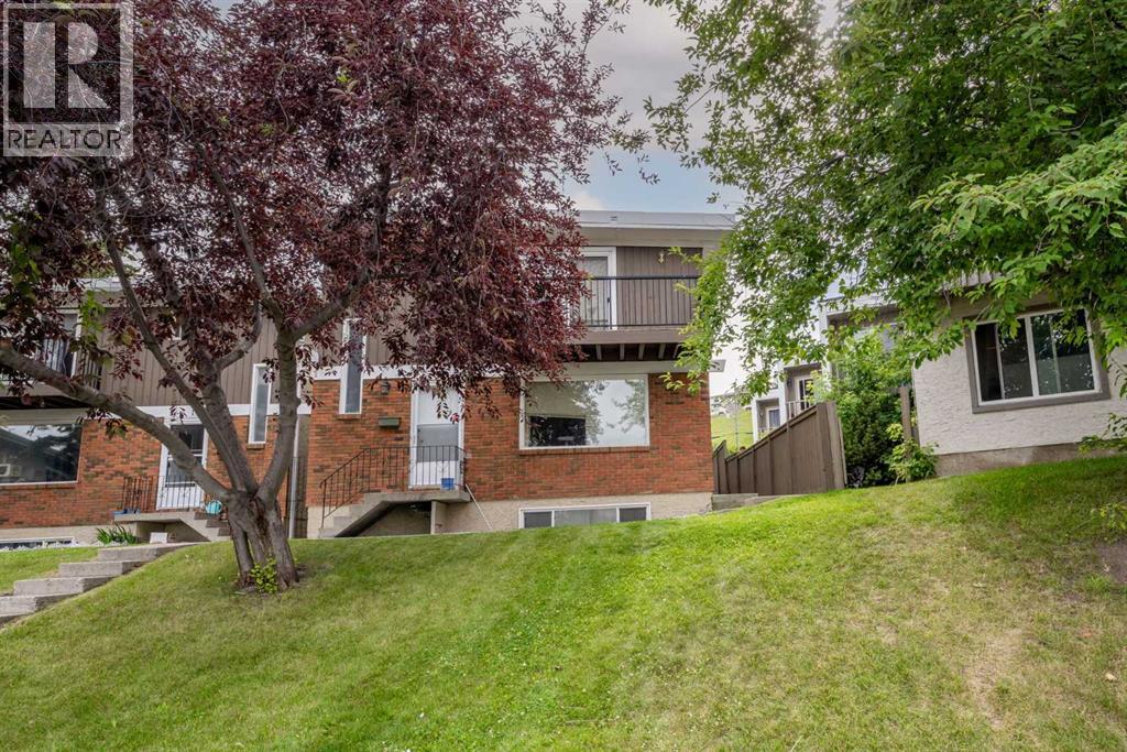 8, 111 Huntington Park Green Nw, Calgary, Alberta  T2K 5H4 - Photo 1 - A2329789