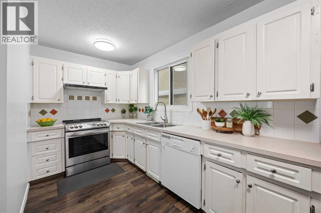 8, 111 Huntington Park Green Nw, Calgary, Alberta  T2K 5H4 - Photo 12 - A2329789