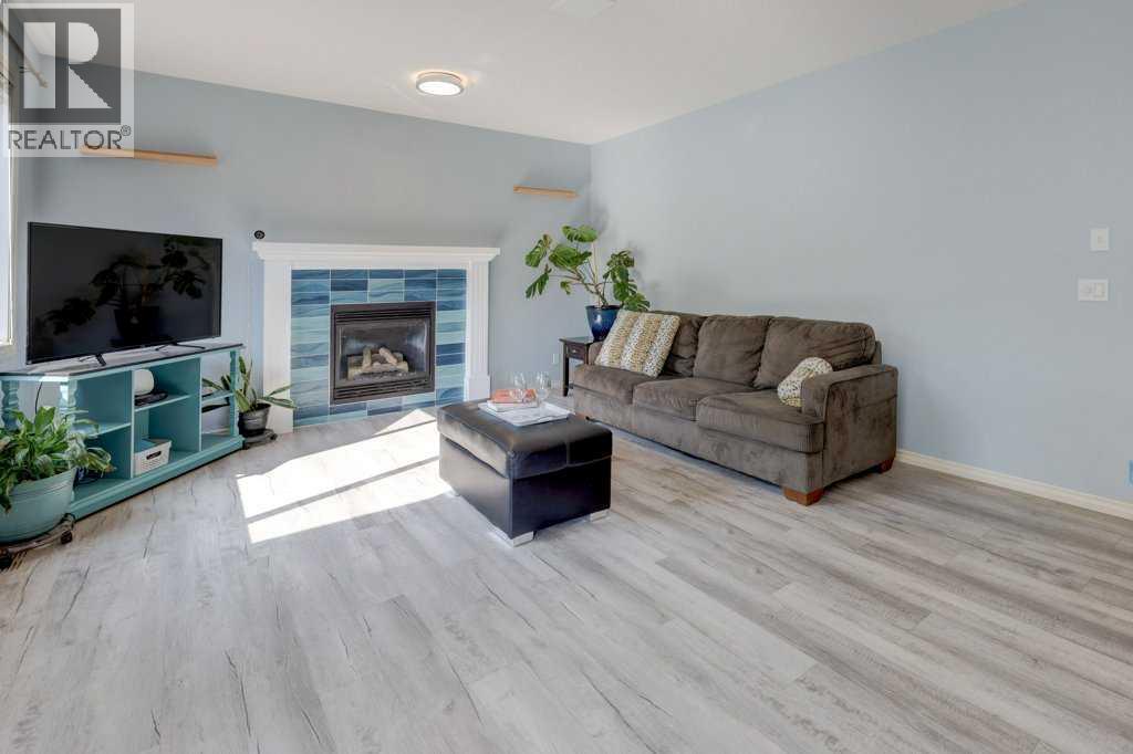 242 Crystal Green Point, Okotoks, Alberta  T1S 2K7 - Photo 6 - A2330836