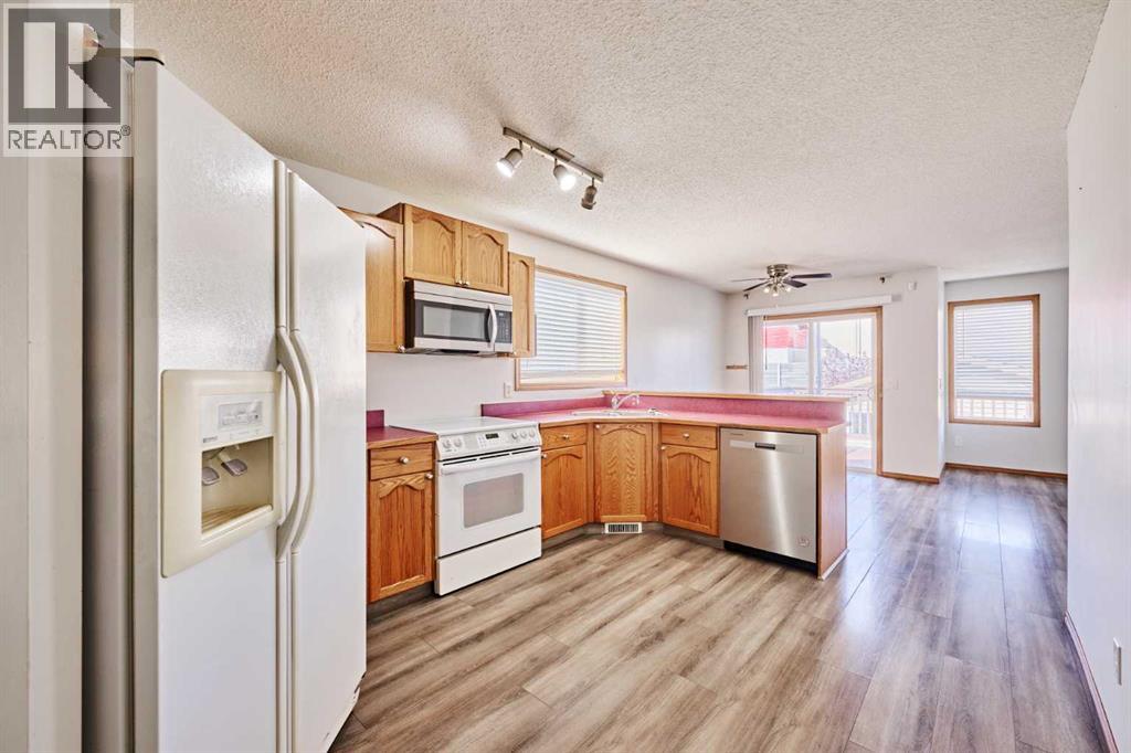 240 Covehaven Road NE, Calgary, Alberta  T3K 5W8 - Photo 4 - A2342704