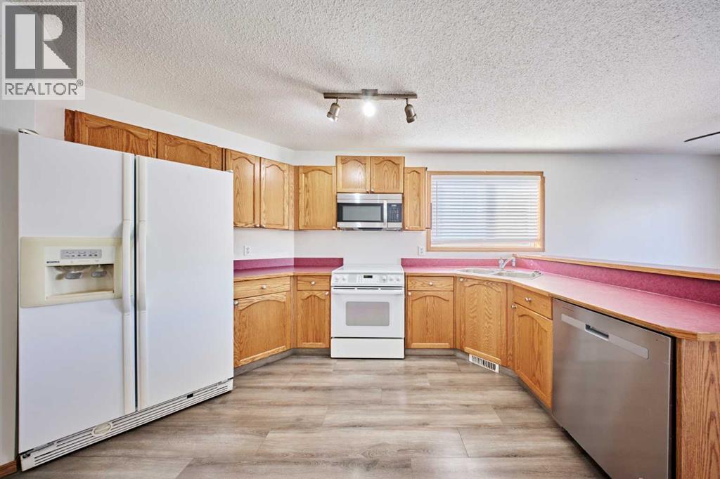 240 Covehaven Road NE, Calgary, Alberta  T3K 5W8 - Photo 5 - A2342704