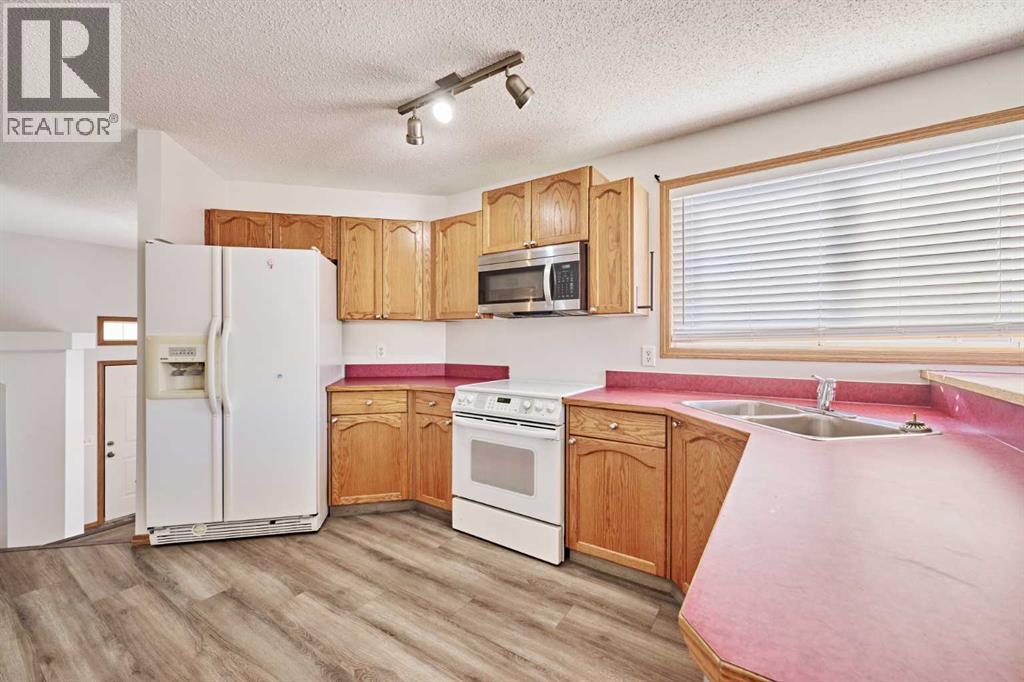 240 Covehaven Road NE, Calgary, Alberta  T3K 5W8 - Photo 6 - A2342704