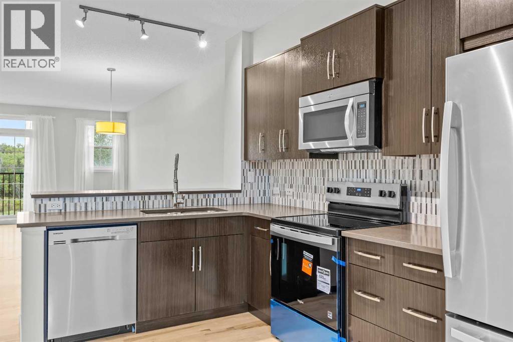 505 Ascot Circle SW, Calgary, Alberta  T3H 0W9 - Photo 10 - A2342654