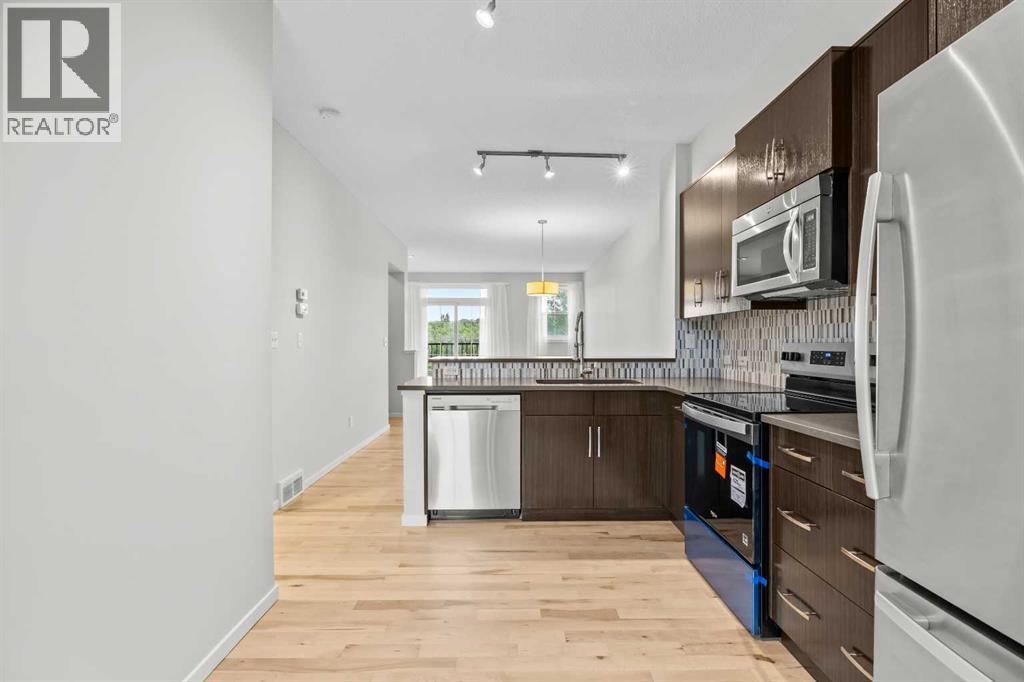 505 Ascot Circle SW, Calgary, Alberta  T3H 0W9 - Photo 7 - A2342654