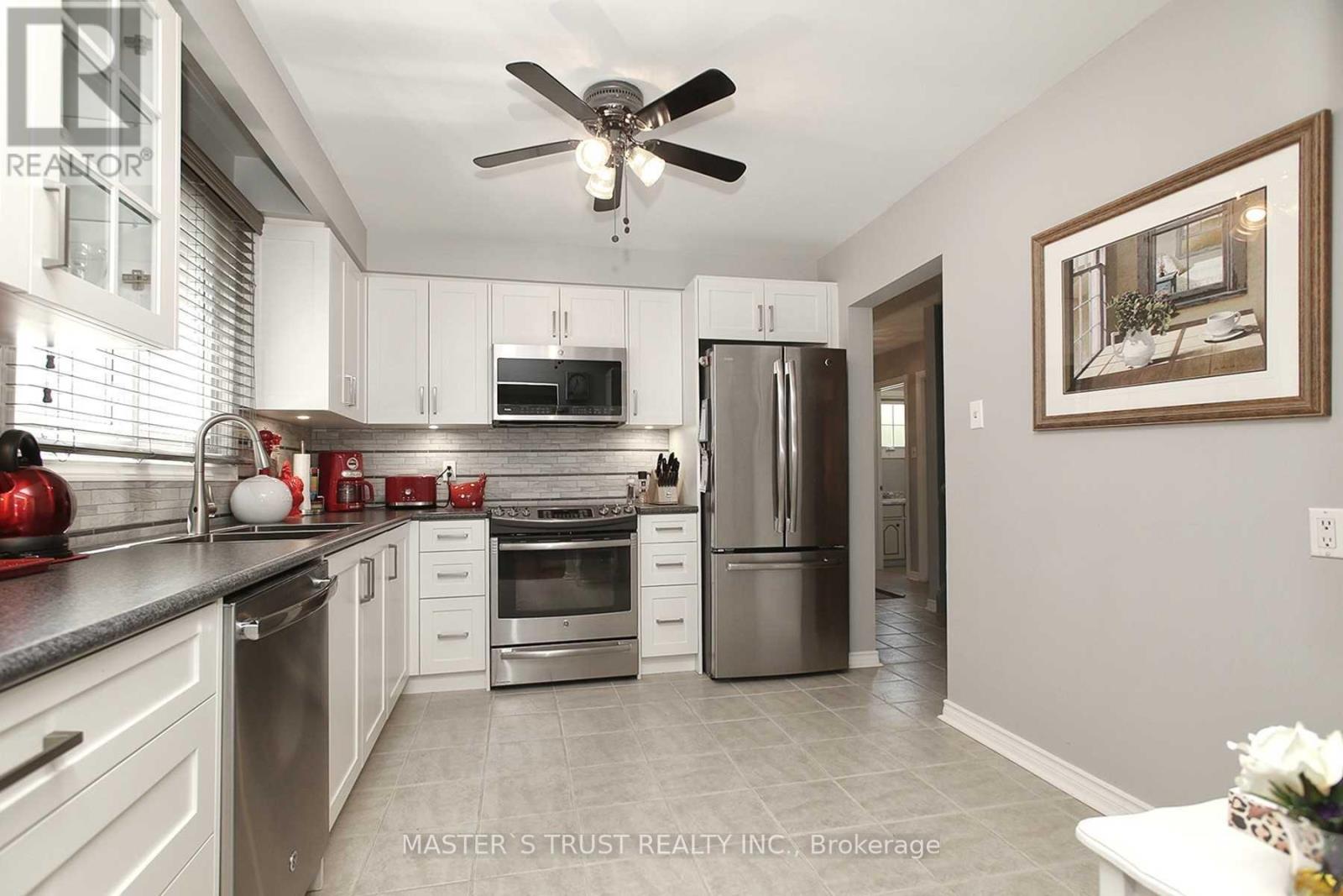 1319 White Oaks Boulevard E, Oakville, Ontario  L6H 2N7 - Photo 4 - W13744984
