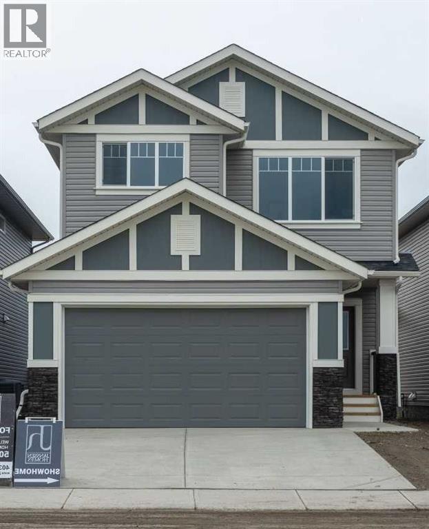 546 Rivercrest View, Cochrane, Alberta  T4C 2W9 - Photo 1 - A2328807