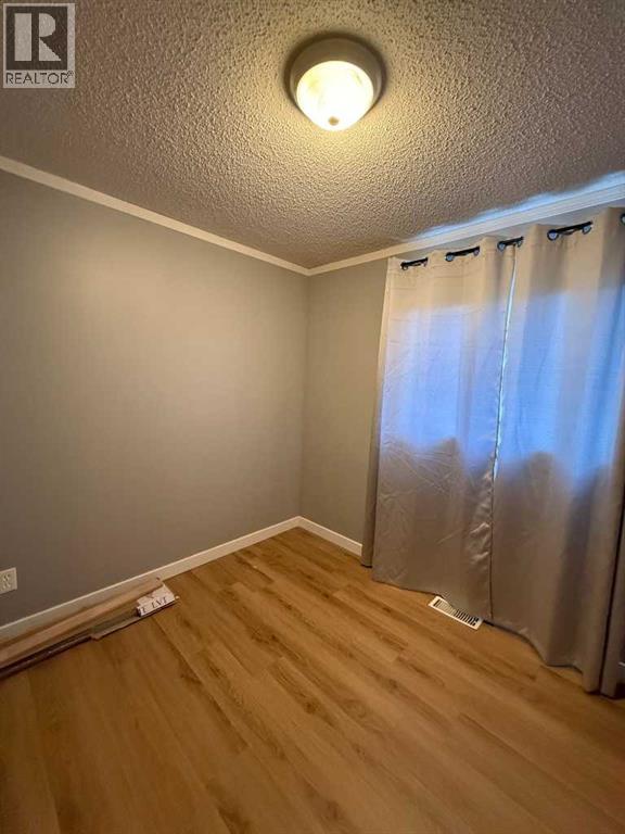 21 Driftwood Drive, High Level, Alberta  T0H 1Z0 - Photo 8 - A2342656