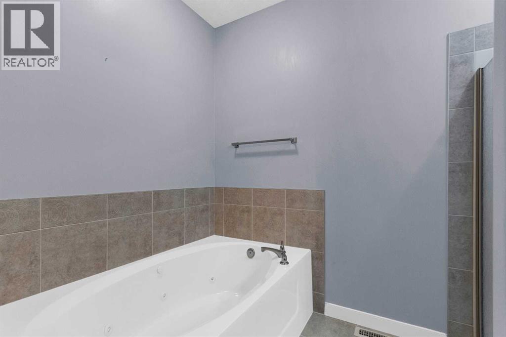 8 Bridle Estates Manor SW, Calgary, Alberta  T2Y 4H4 - Photo 21 - A2319637