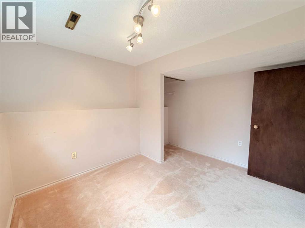 5103 40 Street, Innisfail, Alberta  T4G 1H8 - Photo 28 - A2342437