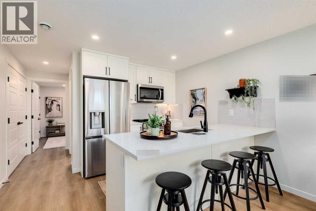 113, 40 Livingston Parade NE, Calgary, Alberta T4B 3P6 - Photo 1 - A2342683