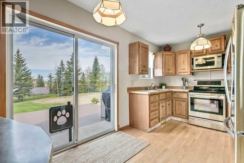 42239 Weedon Trail, Rural Rocky View County, Alberta T4C 3A2 - Photo 10 - A2314623