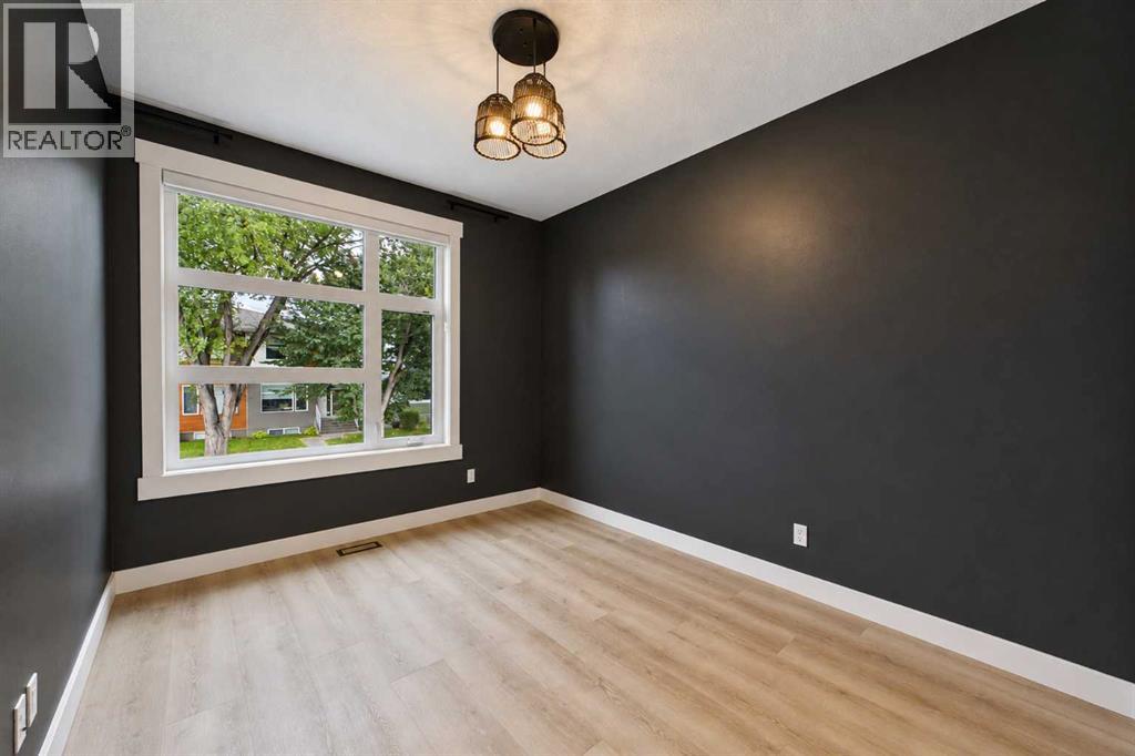406 33 Avenue NW, Calgary, Alberta  T2K 0B4 - Photo 35 - A2336044