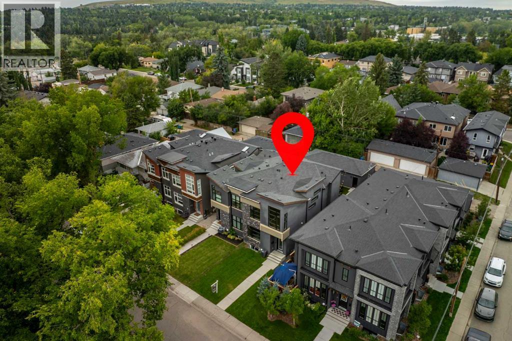 406 33 Avenue NW, Calgary, Alberta  T2K 0B4 - Photo 4 - A2336044