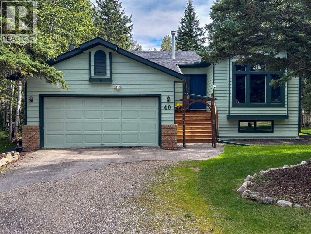 49 Manyhorses Drive, Rural Rocky View County, Alberta  T3Z 1A4 - Photo 2 - A2342424