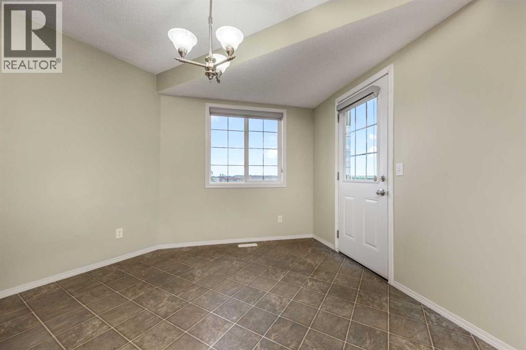 276 Taralake Terrace Ne, Calgary, Alberta  T3J 0A2 - Photo 9 - A2314304
